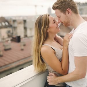 sensual-couple-rooftop-romance.jpg